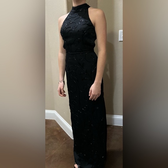 Long Black beaded Dress with open back, choker-collared neck and side slit. - Picture 2 of 5